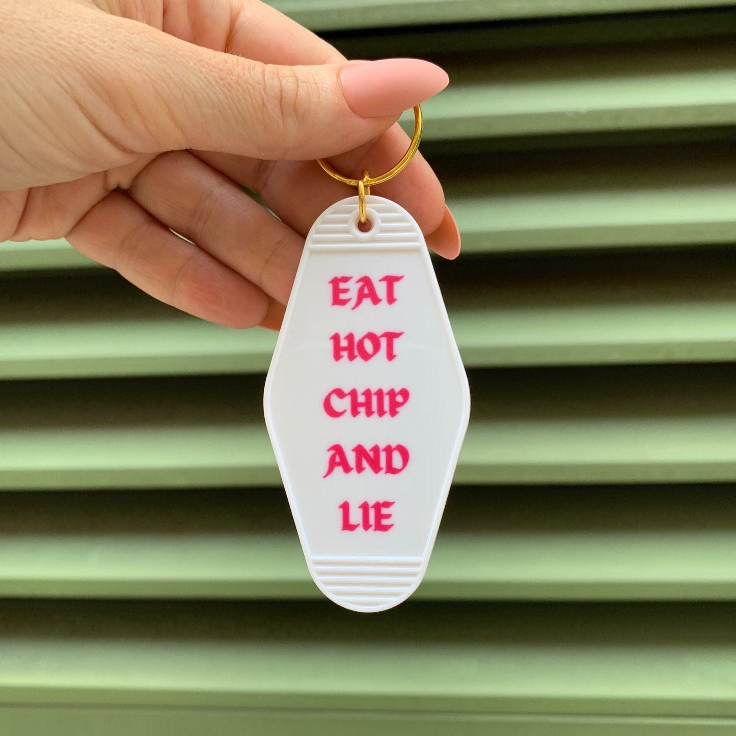 Eat Hot Chip and Lie Motel Style Keychain in White